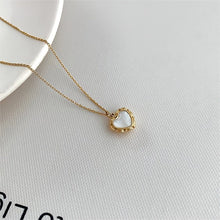 Load image into Gallery viewer, Ari 18K Gold Plated Heart Shell Necklace - Serenity Handmade Jewelry
